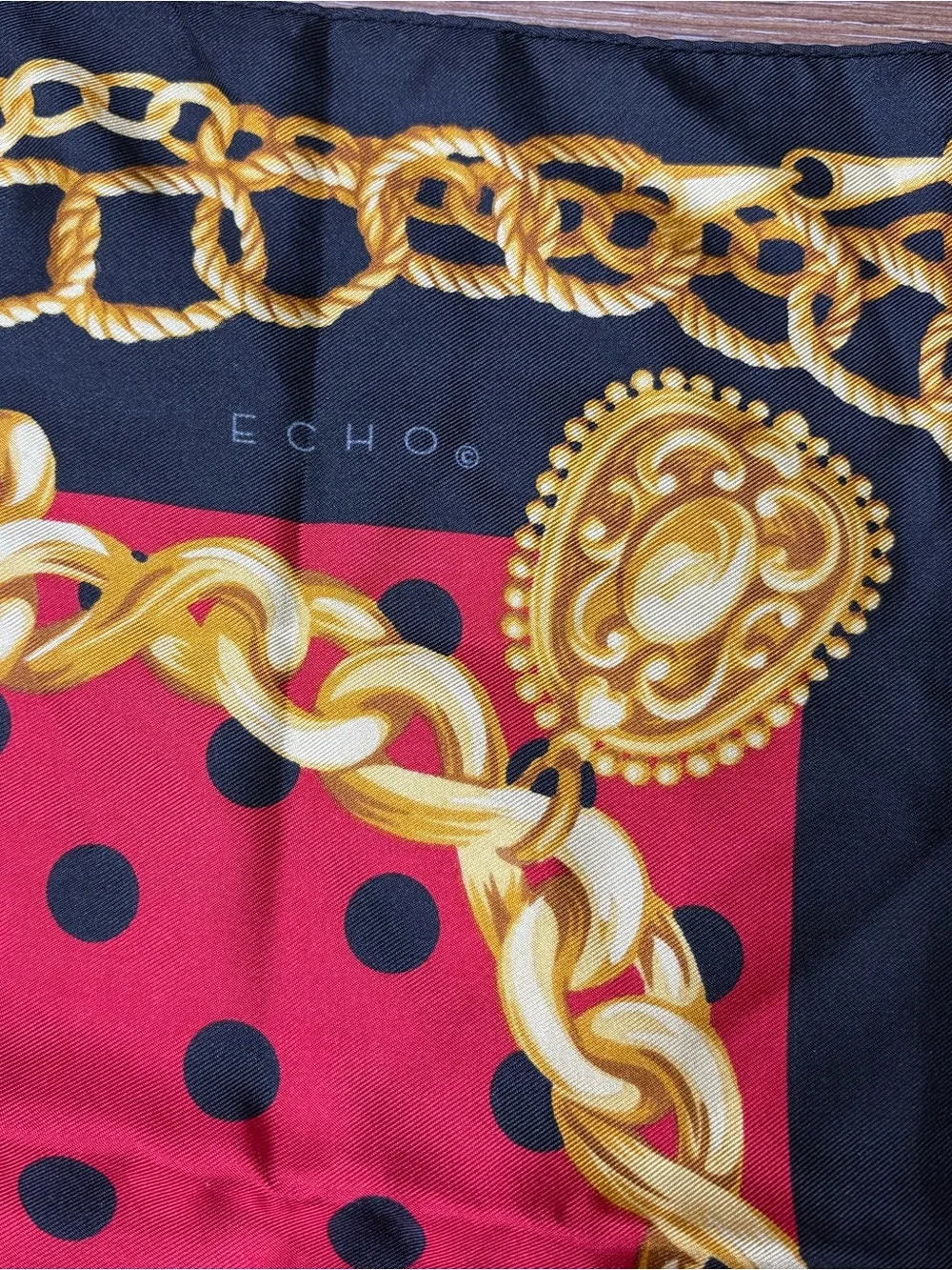 Echo Red & Black Polka Dot Scarf with Gold Chain Motif